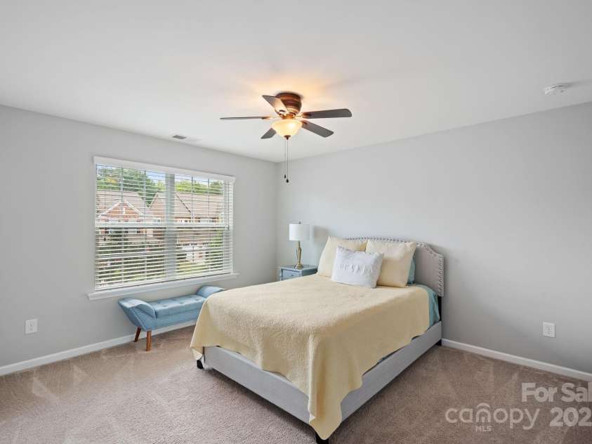 131 Cherry Bark Drive, Mooresville, NC 28117.  MLS# CAR4270193, YatesRealty ID 23893. Guest Bedroom w/ ceiling Fan