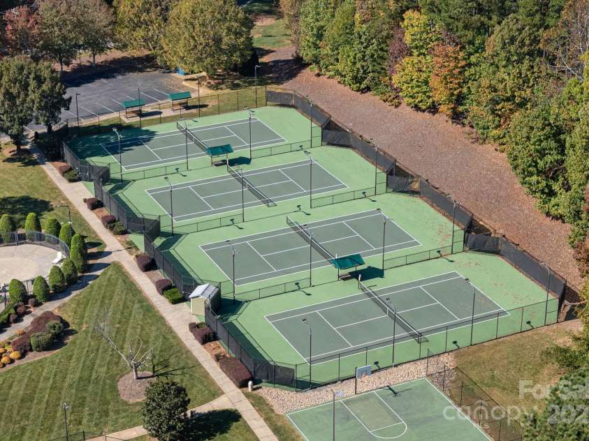 131 Cherry Bark Drive, Mooresville, NC 28117.  MLS# CAR4270193, YatesRealty ID 23893. Six Tennis Courts