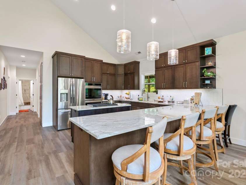 143 Burnside Trail, Hendersonville, NC 28792.  MLS# CAR4258291, YatesRealty ID 23895. Breakfast bar.