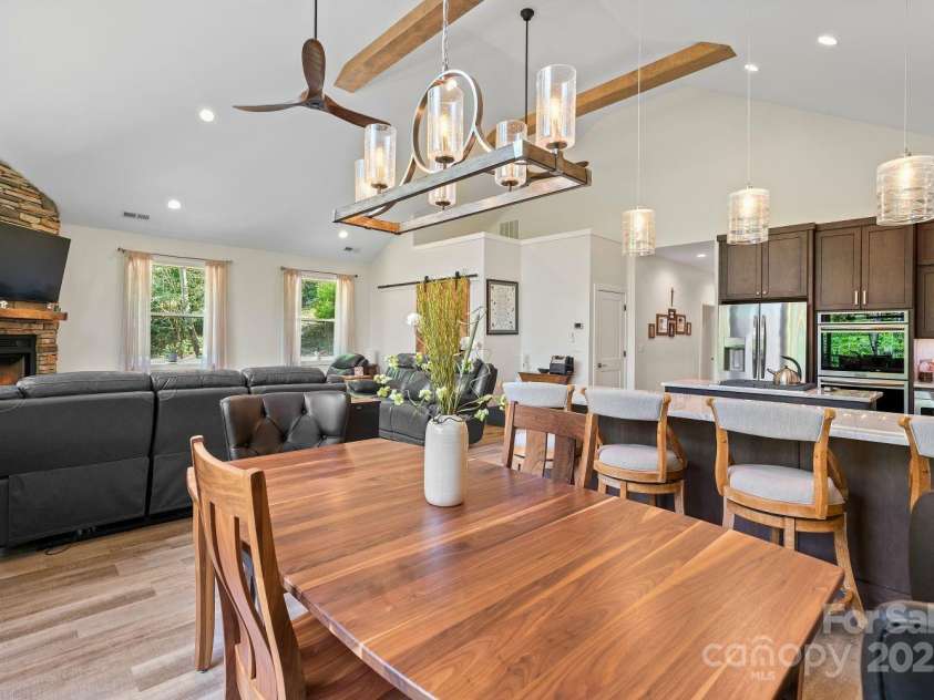 143 Burnside Trail, Hendersonville, NC 28792.  MLS# CAR4258291, YatesRealty ID 23895. Dining area and breakfast bar.
