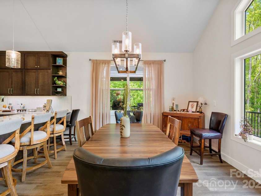 143 Burnside Trail, Hendersonville, NC 28792.  MLS# CAR4258291, YatesRealty ID 23895. Dining area and breakfast bar.