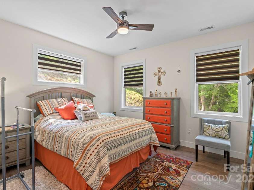 143 Burnside Trail, Hendersonville, NC 28792.  MLS# CAR4258291, YatesRealty ID 23895. Second bedroom (main level).