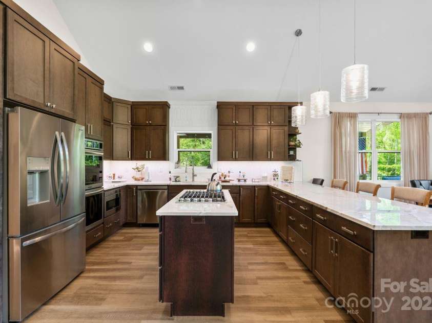 143 Burnside Trail, Hendersonville, NC 28792.  MLS# CAR4258291, YatesRealty ID 23895. Upgraded cabinetry and countertops.