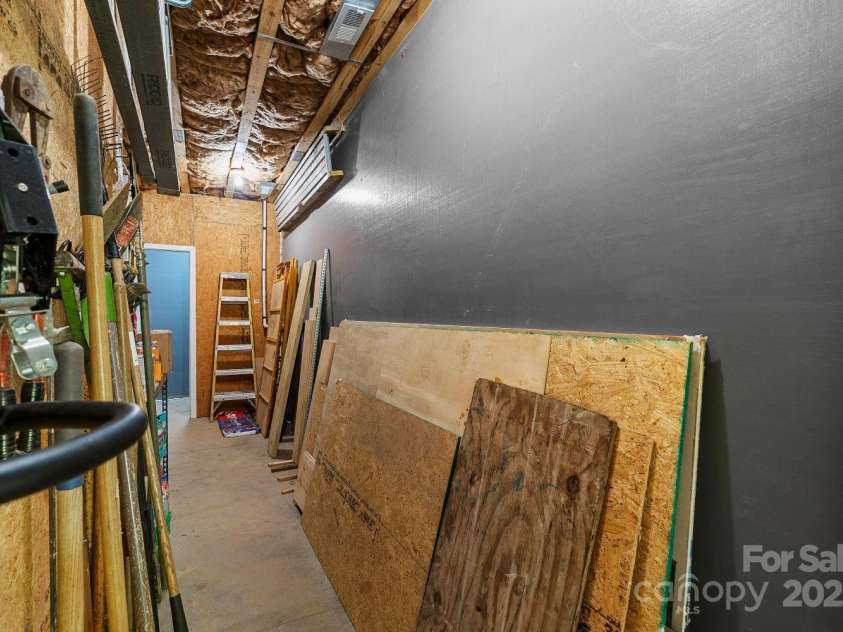 143 Burnside Trail, Hendersonville, NC 28792.  MLS# CAR4258291, YatesRealty ID 23895. Waterproof membrane and French drain, installed during construction.