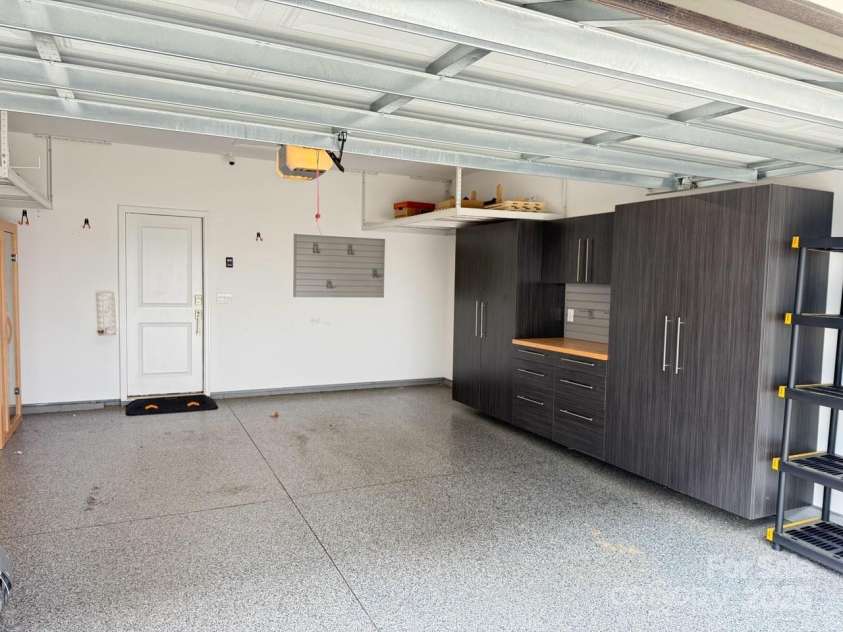 114 Mint Avenue, Mooresville, NC 28117.  MLS# CAR4265646, YatesRealty ID 23898. Custom 2 car garage w/epoxy floor
