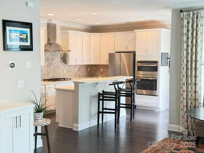 114 Mint Avenue, Mooresville, NC 28117.  MLS# CAR4265646, YatesRealty ID 23898. Kitchen w/ bar