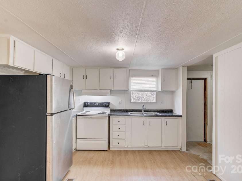 6 & 10 Lands End Drive, Candler, NC 28715.  MLS# CAR4242356, YatesRealty ID 239. 