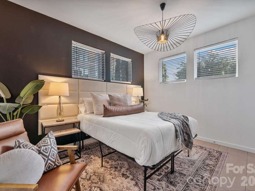 1605 Cannon View Lane, Charlotte, NC 28208.  MLS# CAR4364841, YatesRealty ID 23902. Lower-level guest bedroom.