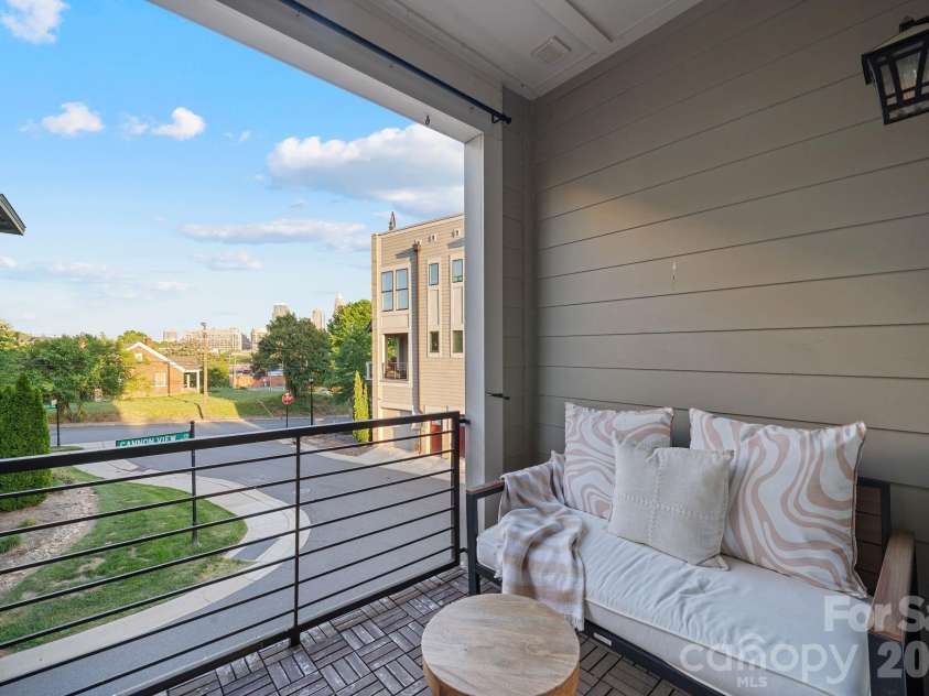 1605 Cannon View Lane, Charlotte, NC 28208.  MLS# CAR4364841, YatesRealty ID 23902. Outdoor covered patio off kitchen.