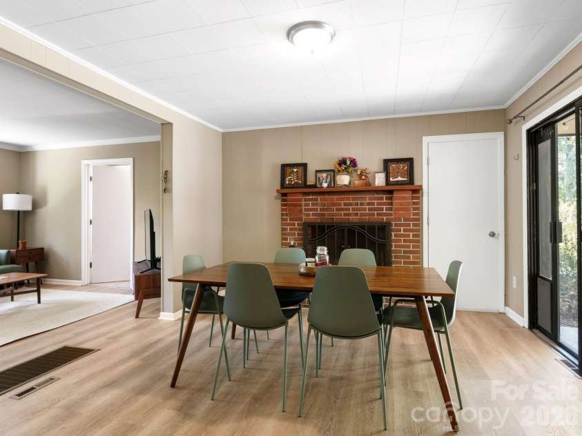 97 Columbia Circle, Hendersonville, NC 28792.  MLS# CAR4381538, YatesRealty ID 23914. Dine by the Fire