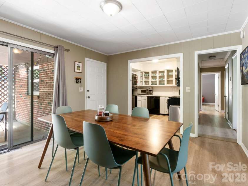 97 Columbia Circle, Hendersonville, NC 28792.  MLS# CAR4381538, YatesRealty ID 23914. Dining Into Kitchen