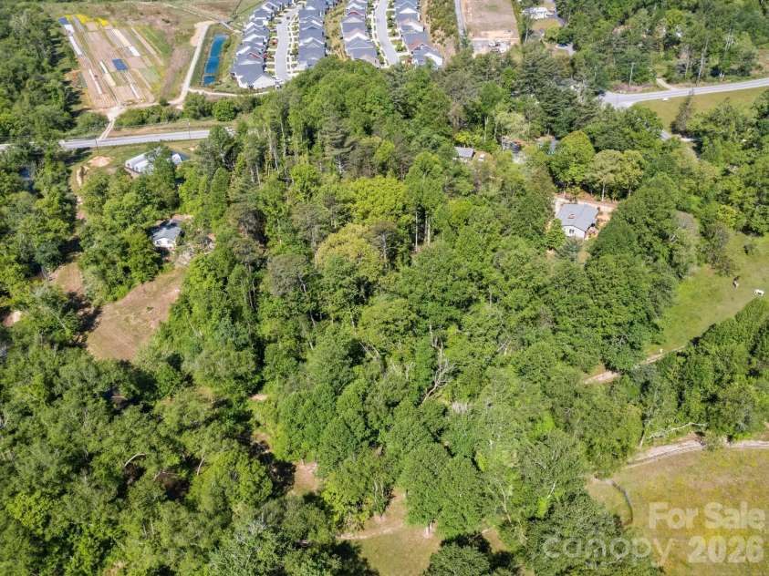 97 Columbia Circle, Hendersonville, NC 28792.  MLS# CAR4381538, YatesRealty ID 23914. Drone Shot