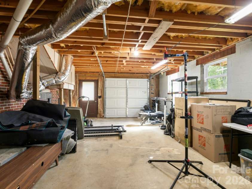 97 Columbia Circle, Hendersonville, NC 28792.  MLS# CAR4381538, YatesRealty ID 23914. Garage