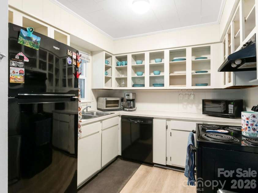 97 Columbia Circle, Hendersonville, NC 28792.  MLS# CAR4381538, YatesRealty ID 23914. Open Shelve Kitchen