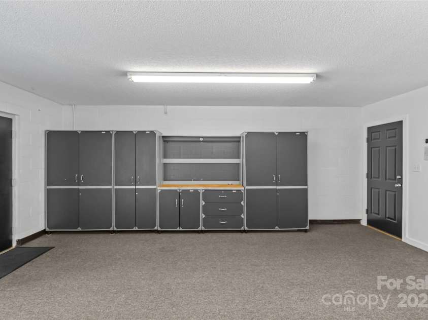 1019 Westlake Drive, Kannapolis, NC 28081.  MLS# CAR4275178, YatesRealty ID 23926. Workspace in garage