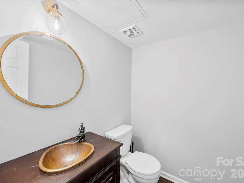 10449 Quiet Bay Court, Charlotte, NC 28278.  MLS# CAR4382877, YatesRealty ID 23926. Downstairs Half Bath