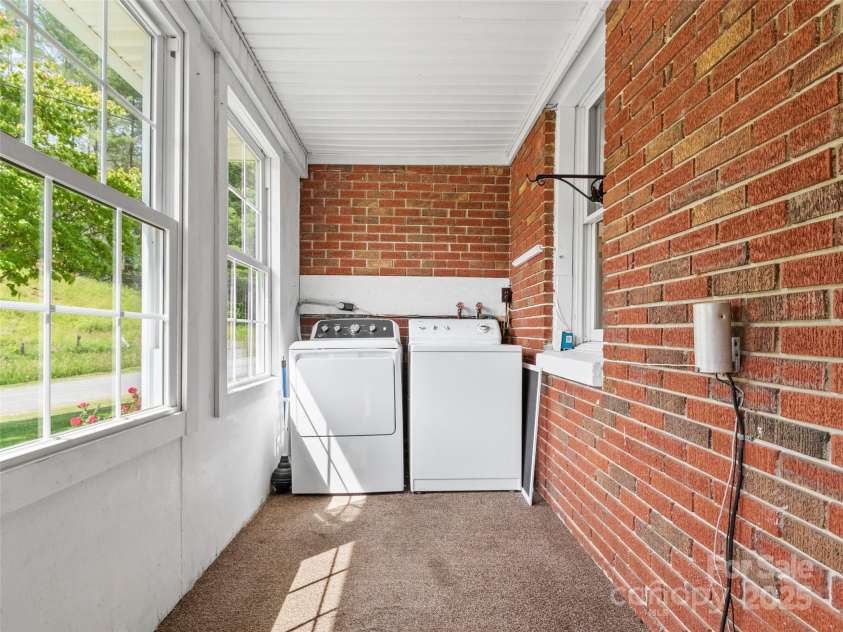 244 Carl Fox Road, Burnsville, NC 28714.  MLS# CAR4271259, YatesRealty ID 23928. Laundry in garage