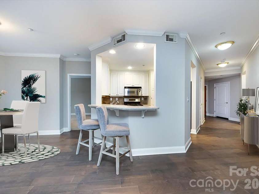 415 Church Street, Charlotte, NC 28202.  MLS# CAR4349165, YatesRealty ID 2393. Virtually staged to show furniture placement.