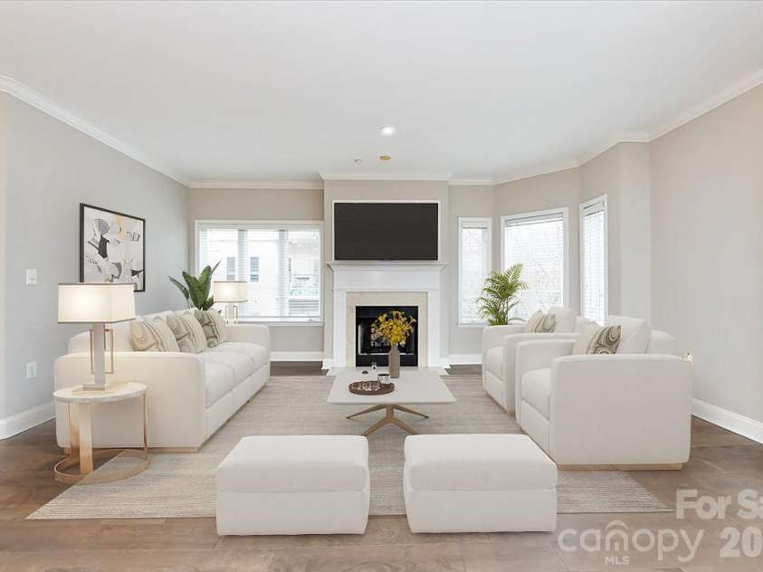 415 Church Street, Charlotte, NC 28202.  MLS# CAR4349165, YatesRealty ID 2393. Virtually staged to show furniture placement 