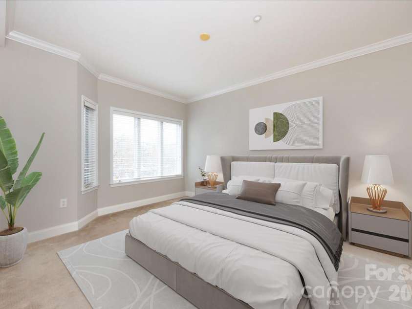 415 Church Street, Charlotte, NC 28202.  MLS# CAR4349165, YatesRealty ID 2393. Virtually staged to show furniture placement 