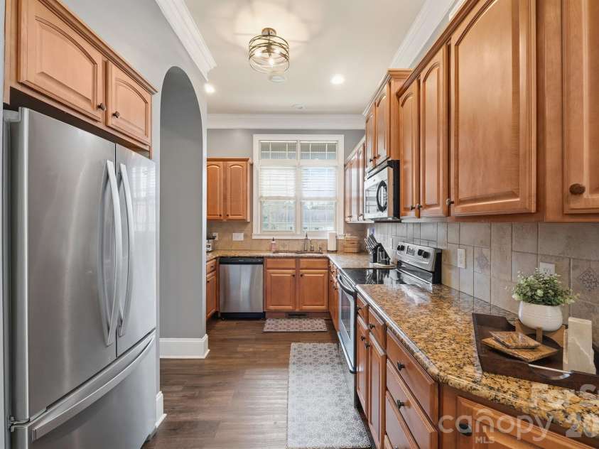 140 Pine Bluff Drive, Mooresville, NC 28117.  MLS# CAR4355986, YatesRealty ID 23939. Main Level Kitchen