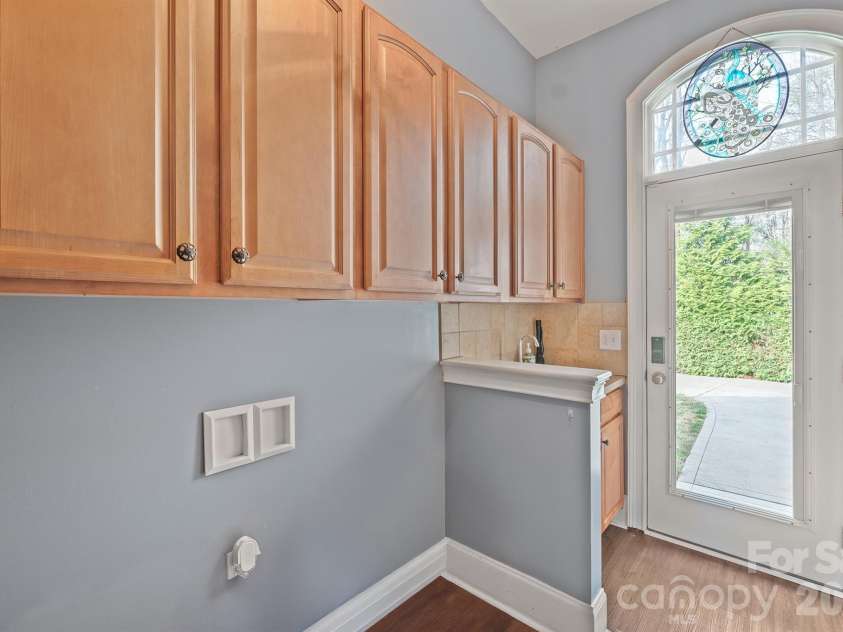 140 Pine Bluff Drive, Mooresville, NC 28117.  MLS# CAR4355986, YatesRealty ID 23939. Main Level Laundry