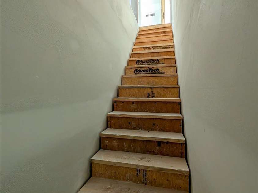 338 Majestic Mountain Drive, Burnsville, NC 28714.  MLS# CAR4277521, YatesRealty ID 2394. Stairs to Basement access