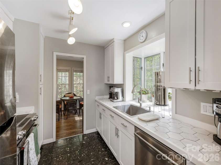 403 Cherokee Road, Asheville, NC 28804.  MLS# CAR4367190, YatesRealty ID 23941. Garden Window in Kitchen