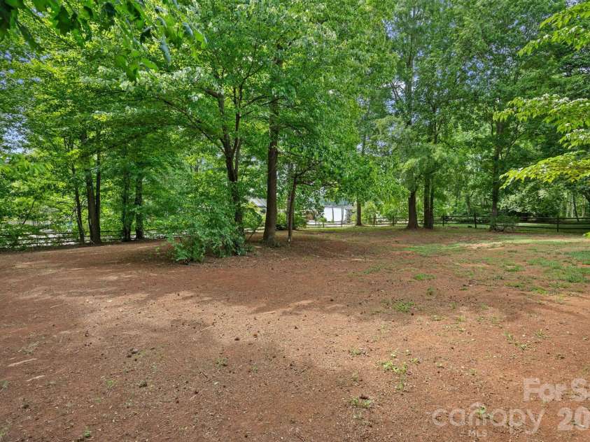 207 Kilborne Road, Mooresville, NC 28117.  MLS# CAR4373290, YatesRealty ID 23944. Backyard