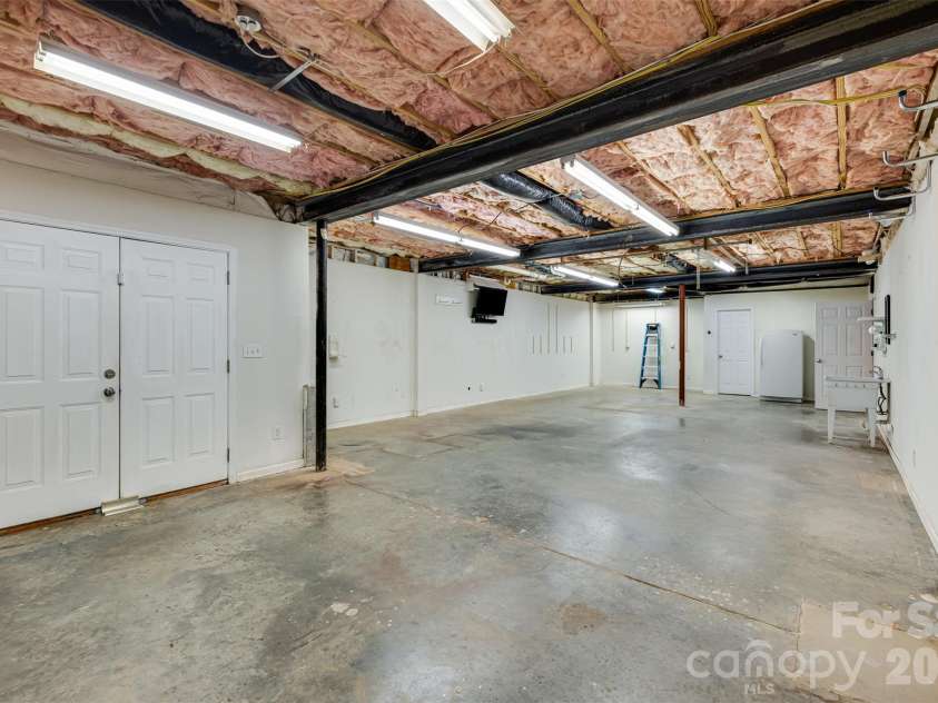 101 Woodwinds Drive, Mount Holly, NC 28120.  MLS# CAR4381091, YatesRealty ID 23947. Heated/cooled workshop 