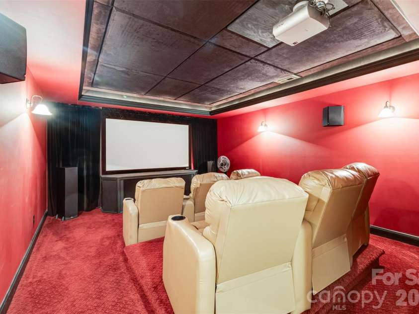 101 Woodwinds Drive, Mount Holly, NC 28120.  MLS# CAR4381091, YatesRealty ID 23947. Theater in basement 