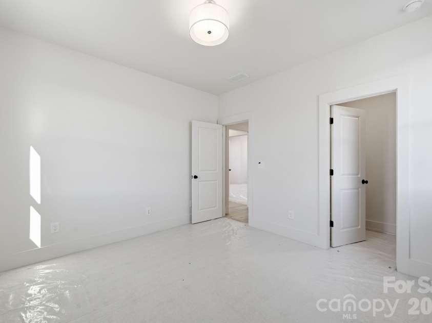 7245 Westrow Avenue, Charlotte, NC 28278.  MLS# CAR4314661, YatesRealty ID 2395. Bedroom #2 is a bright and inviting space with a walk-in closest for extra storage.