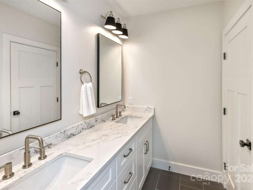 120 Gashes Creek Road, Asheville, NC 28805.  MLS# CAR4273637, YatesRealty ID 23957. Lower Level Bath