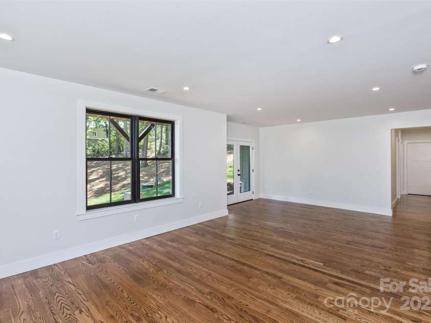 120 Gashes Creek Road, Asheville, NC 28805.  MLS# CAR4273637, YatesRealty ID 23957. Lower Level Living Area