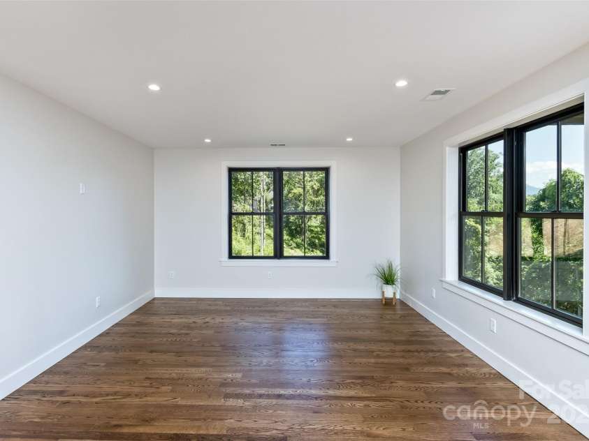 120 Gashes Creek Road, Asheville, NC 28805.  MLS# CAR4273637, YatesRealty ID 23957. Lower Level Living Area