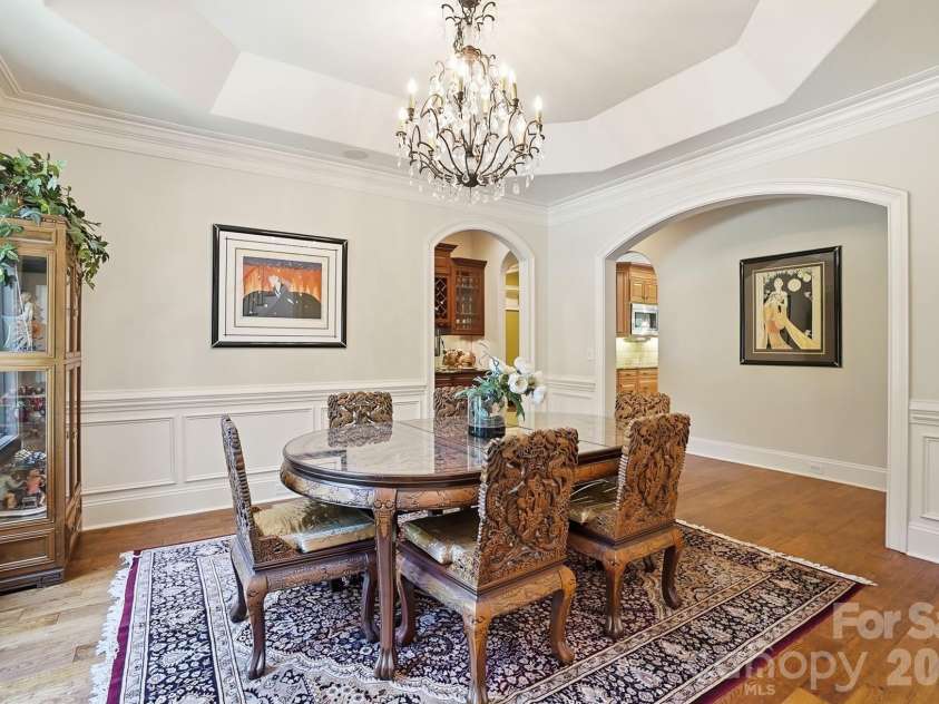 932 Thorn Ridge Lane, Clover, SC 29710.  MLS# CAR4346991, YatesRealty ID 23957. Formal dining room with arched doorways, wainscoting and tray ceiling