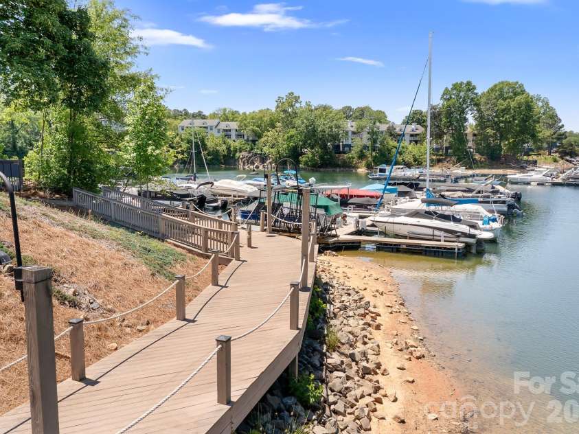 19914 Scanmar Lane, Cornelius, NC 28031.  MLS# CAR4373850, YatesRealty ID 23967. Composite Decking walkway to the marina