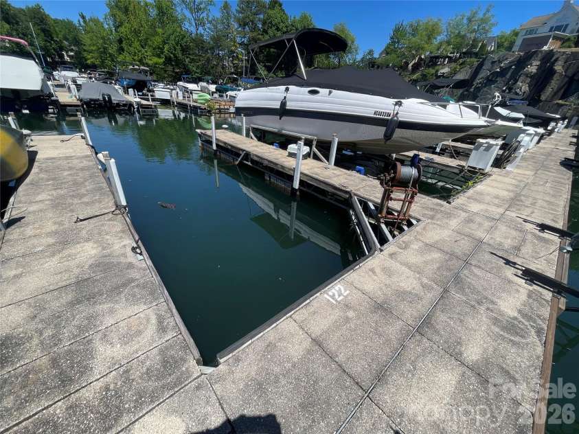 19914 Scanmar Lane, Cornelius, NC 28031.  MLS# CAR4373850, YatesRealty ID 23967. Slip #122.  Water and electric available on dock