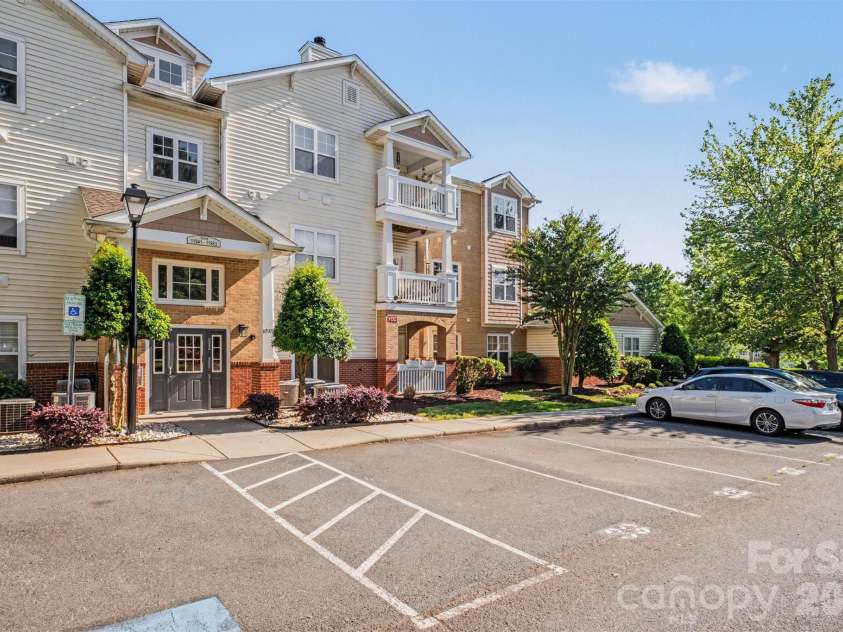 11945 Ridgeway Park Drive, Charlotte, NC 28277.  MLS# CAR4378177, YatesRealty ID 23973. Parking space in front of unit 
