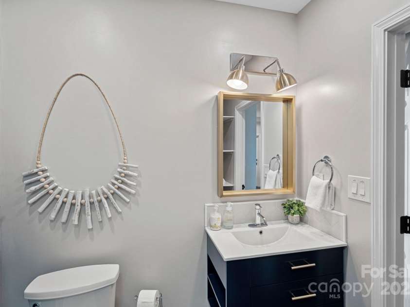 849 Kemp Road, Mooresville, NC 28117.  MLS# CAR4274065, YatesRealty ID 23975. Lower Level Bathroom