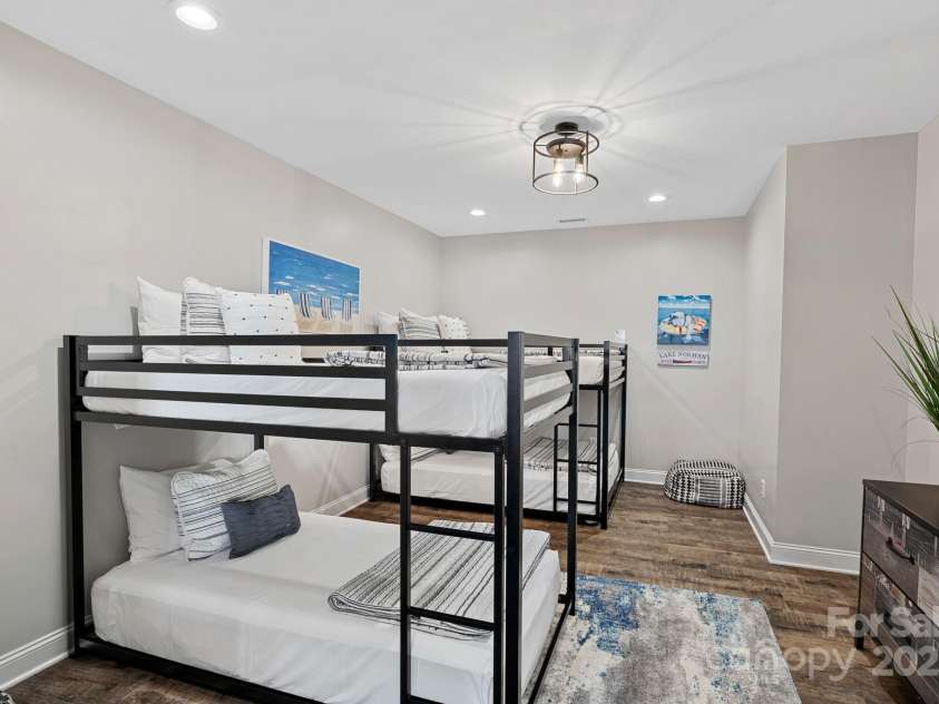 849 Kemp Road, Mooresville, NC 28117.  MLS# CAR4274065, YatesRealty ID 23975. Lower Level bedroom