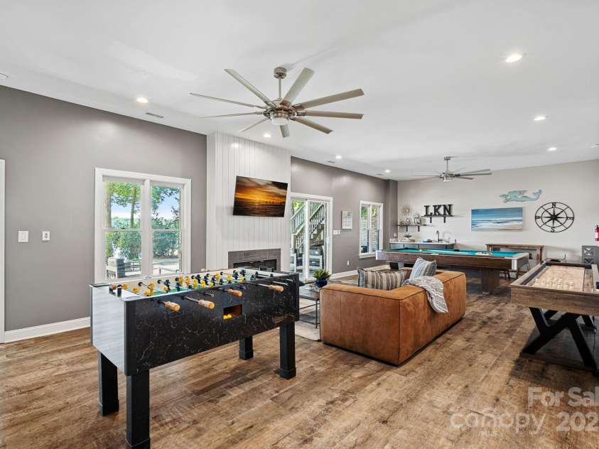 849 Kemp Road, Mooresville, NC 28117.  MLS# CAR4274065, YatesRealty ID 23975. Lower level family room