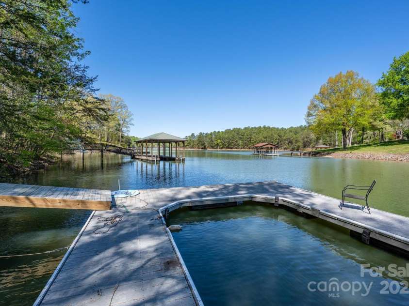 179 Abington Lane, Troutman, NC 28166.  MLS# CAR4244588, YatesRealty ID 23977. New floating dock!