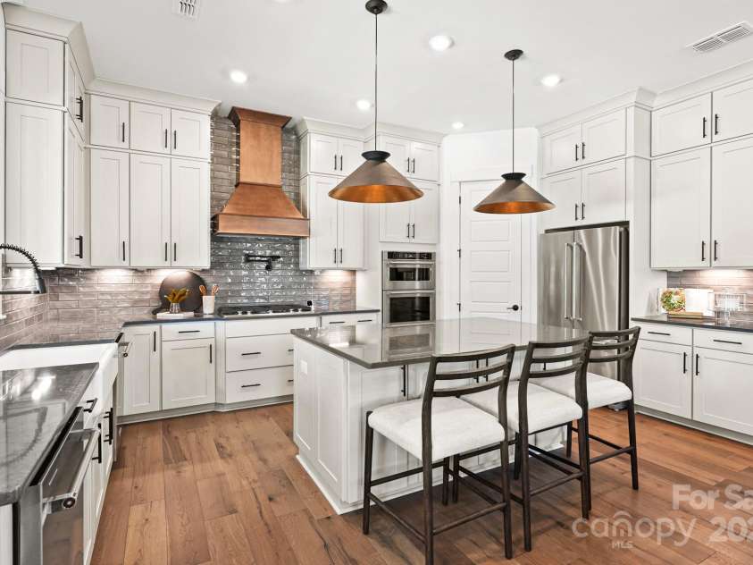 14011 Camden Close Circle, Huntersville, NC 28078.  MLS# CAR4271139, YatesRealty ID 23982. Chef's dream kitchen, farmhouse sink, pot filler and dual dishwashers.