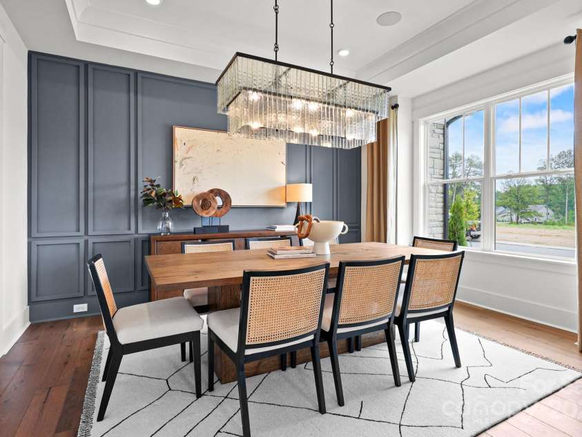14011 Camden Close Circle, Huntersville, NC 28078.  MLS# CAR4271139, YatesRealty ID 23982. Formal dining room with tray ceiling, custom trim and light fixture