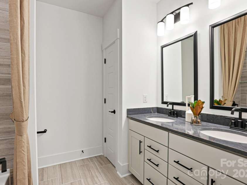 14011 Camden Close Circle, Huntersville, NC 28078.  MLS# CAR4271139, YatesRealty ID 23982. Hall bath with 2 sinks and great storage