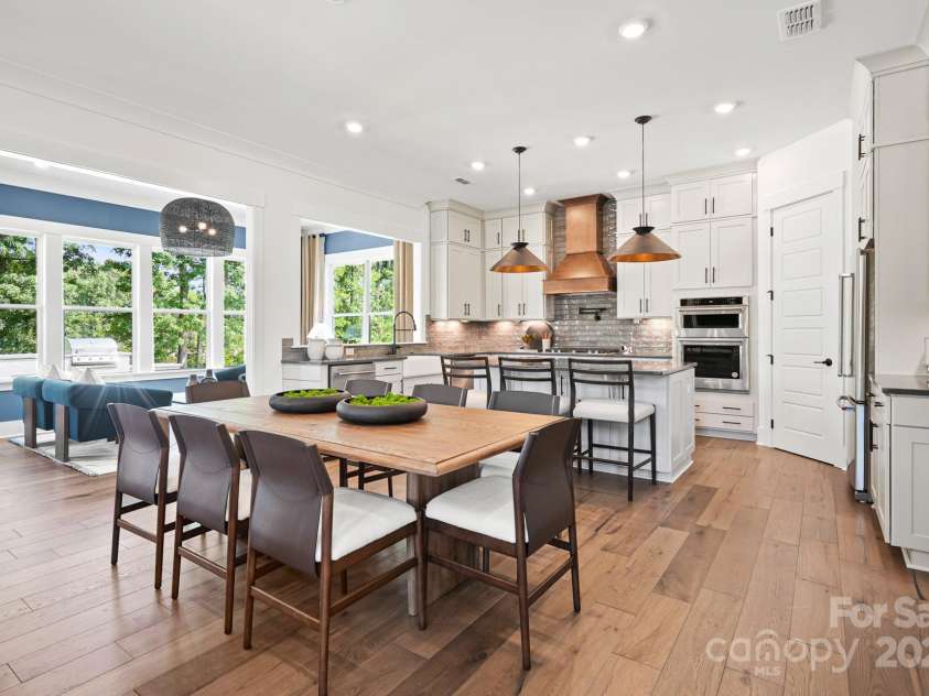 14011 Camden Close Circle, Huntersville, NC 28078.  MLS# CAR4271139, YatesRealty ID 23982. Spacious cafe with plenty of space for a large table