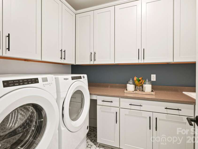 14011 Camden Close Circle, Huntersville, NC 28078.  MLS# CAR4271139, YatesRealty ID 23982. Spacious laundry room with abundant storage and countertop space