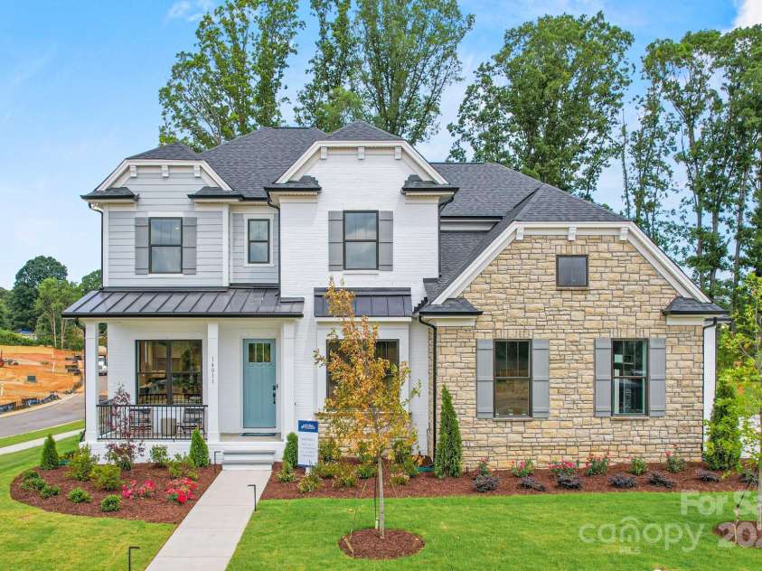 14011 Camden Close Circle, Huntersville, NC 28078.  MLS# CAR4271139, YatesRealty ID 23982. Welcome Home! Award Winning Rexford Model Home.  Beautiful exterior features white painted brick, stone and Hardy siding.