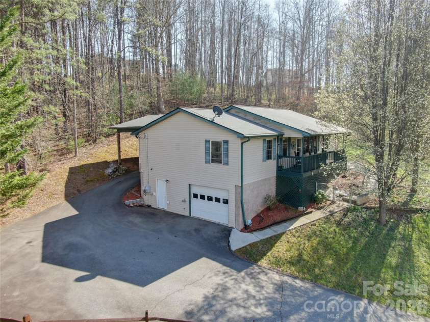 335 Icenhower Road, Leicester, NC 28748.  MLS# CAR4361299, YatesRealty ID 23982. 